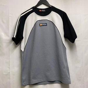 Diesel t-shirt - En snygg diesel t-shirt i träningsmaterial står ingen storlek men skulle säga att den sitter som en M/L. (Obs frakt ingår ej i priset)