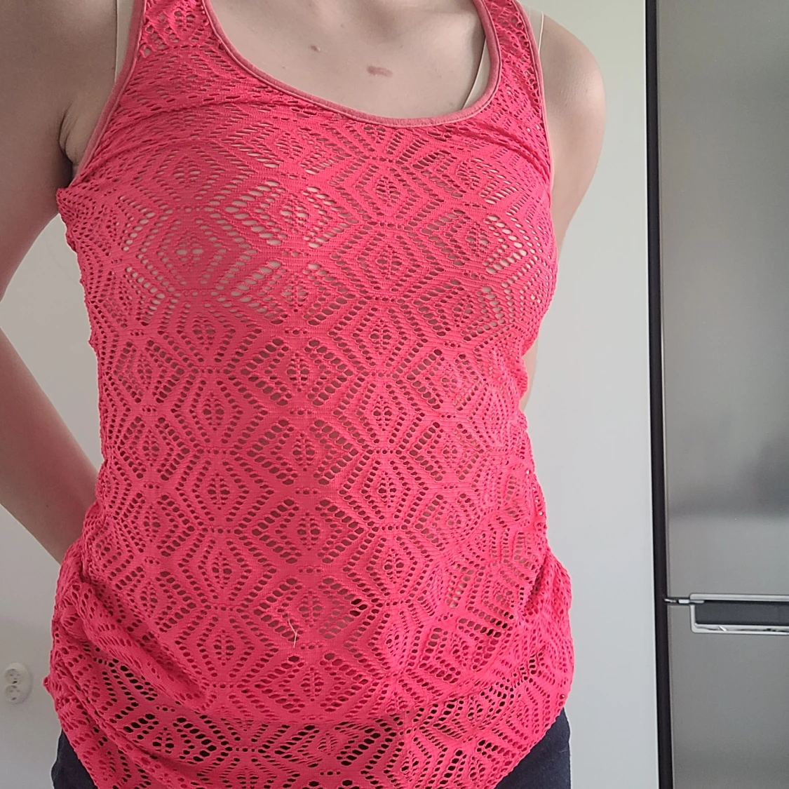 Genomskinlig sporttop