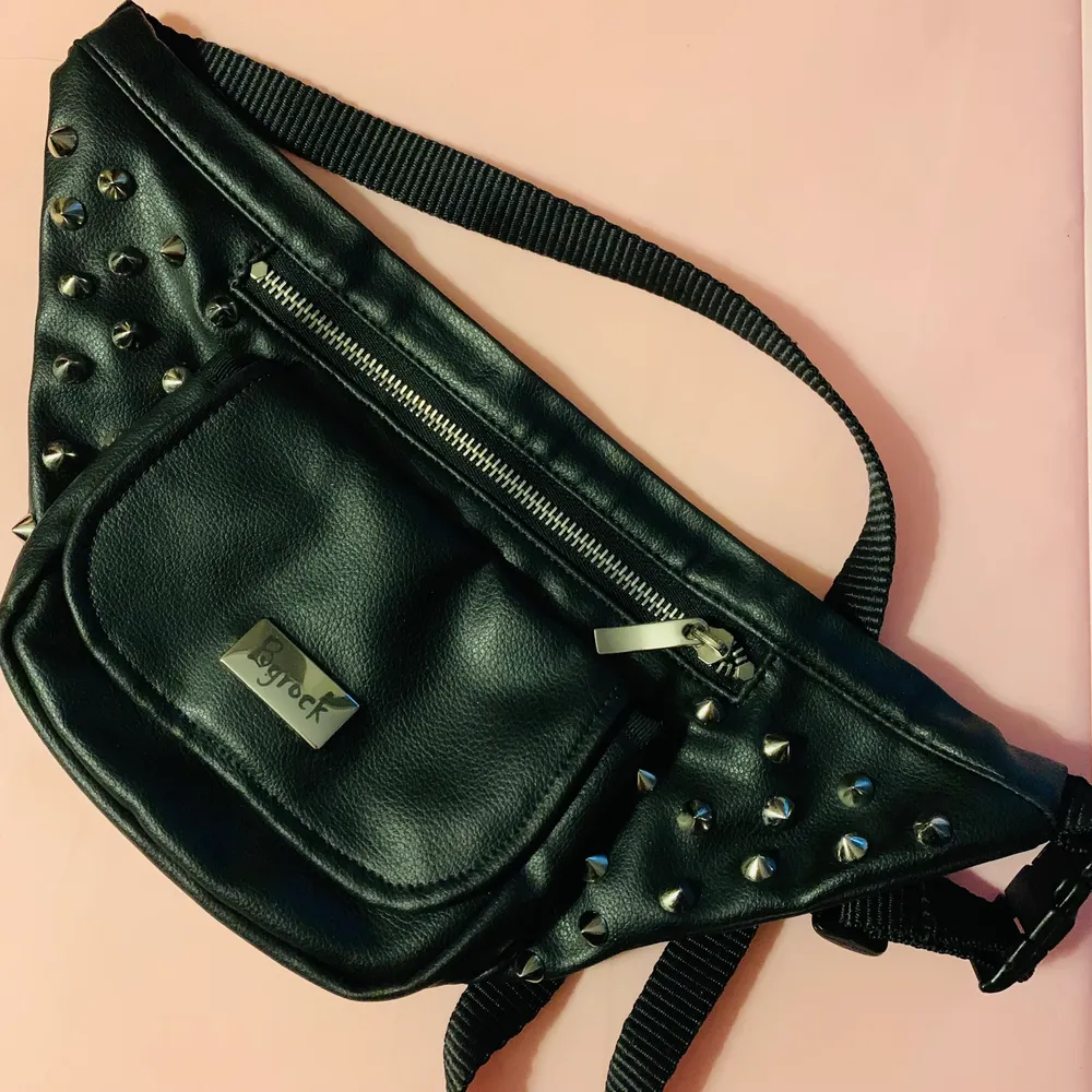 Side bag with cool spikes. Perfect conditions, vegan leather, lots of space for makeup, phone and docs. Väskor.