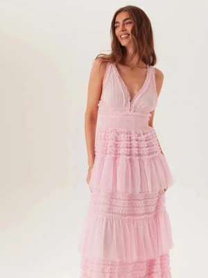 SÖKES  - SÖKES: Frill dotted tulle gown i rosa från Bubbleroom. Storlek 32 eller 34