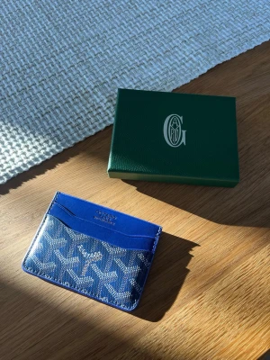 Plånbok goy4rd - Pris går diskuteras vid snabb affär 