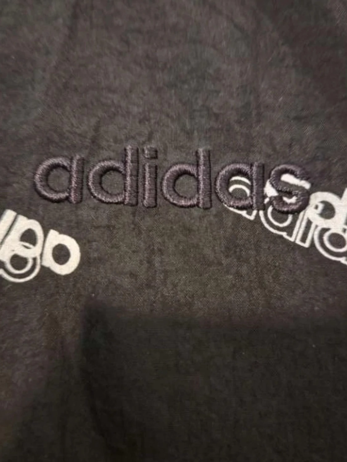 Svart vindjacka från Adidas - 2