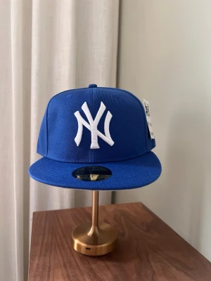 New Era Keps - Ljus blå New Era Keps i ny skick