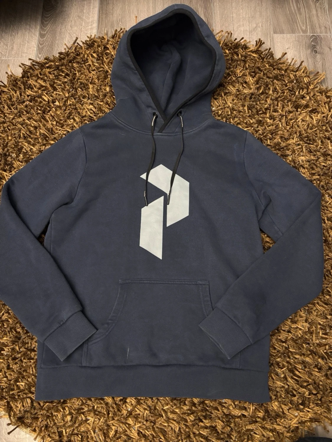 Mörkblå hoodie Peak Performance XS