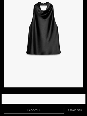 Zara satin haltertop - Svart satin halterneck top från Zara i storlek S. Köpte den i London, passar inte mig och går inte att lämna tillbaks i Sverige😚Aldrig använt, prislapp kvar!