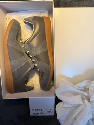 Maison margiela gats (Gray/44) - Great condition margiela gats, never worn. Completely new. Comes with box and dustbags (everything included in the picture). Same day shipping. Receipt is available!