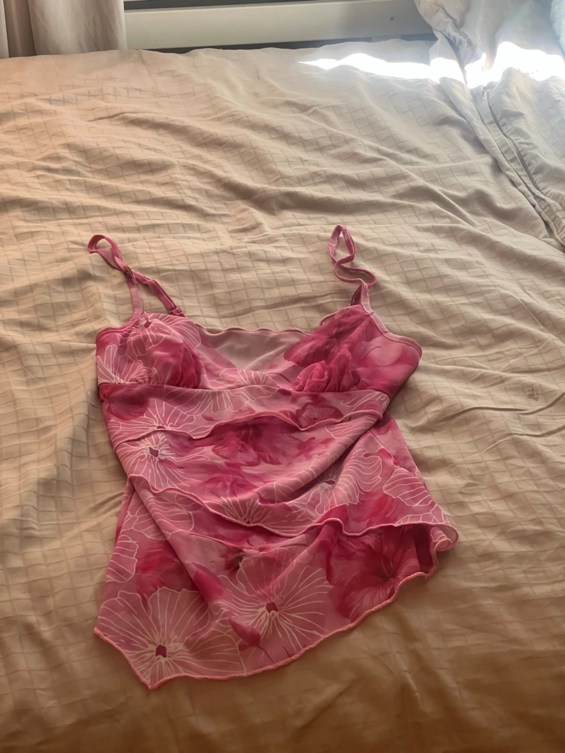 Rosa blommig linnetopp