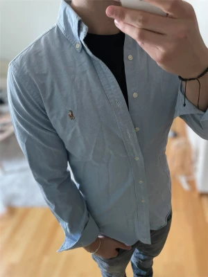 Ljusblå skjorta från Ralph Lauren - Skick 9/10✅storlek s men passar mer som xs!
