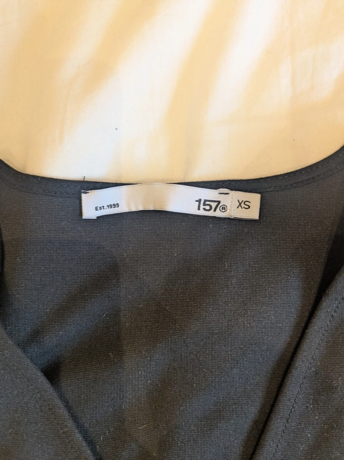 Svart kortärmad topp från 157 - 1