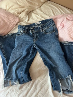 Jeans  - Bootcut Jeans med hål i