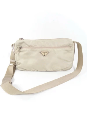 Prada Vela Nylon Messenger Bag - •The Bag has been gently used and is in very good condition • Size: One Size •Color: Beige • Retail price: 10000+ •Height: 15cm Length: 27cm Depth: 10cm