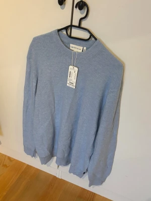 Helt oanvänd Tom Tailor Sweatshirt i ljusblå färg.  - En helt oanvänd Tom Tailor tröja, där lappen till och med är kvar.  Den är i storlek L och besitter en mycket god passform. 