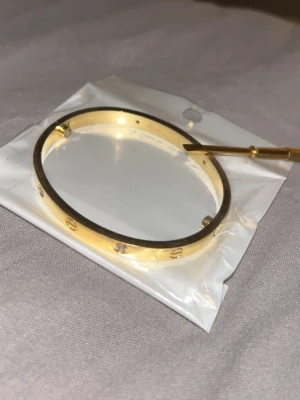 Carti armband - Guld