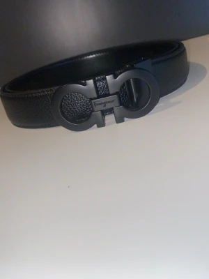 Ferragamo bälte svart - Svart bälte Ferragamo