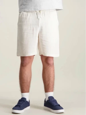 Vita linneshorts med snörning - Säljer ett par ljus beiga linne shorts, dom är i väldigt bra skick och är från kidsbrandstore - Grunt. I storleken M 