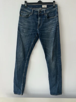 Tiger of Sweden  - Tjena, säljer ett par schyssta tiger of sweden jeans i modellen Evolve, i strl W31/L34 Jeansen är i färgen blå och är i ett bra skick hör gärna av dig om du har några frågor🤗14