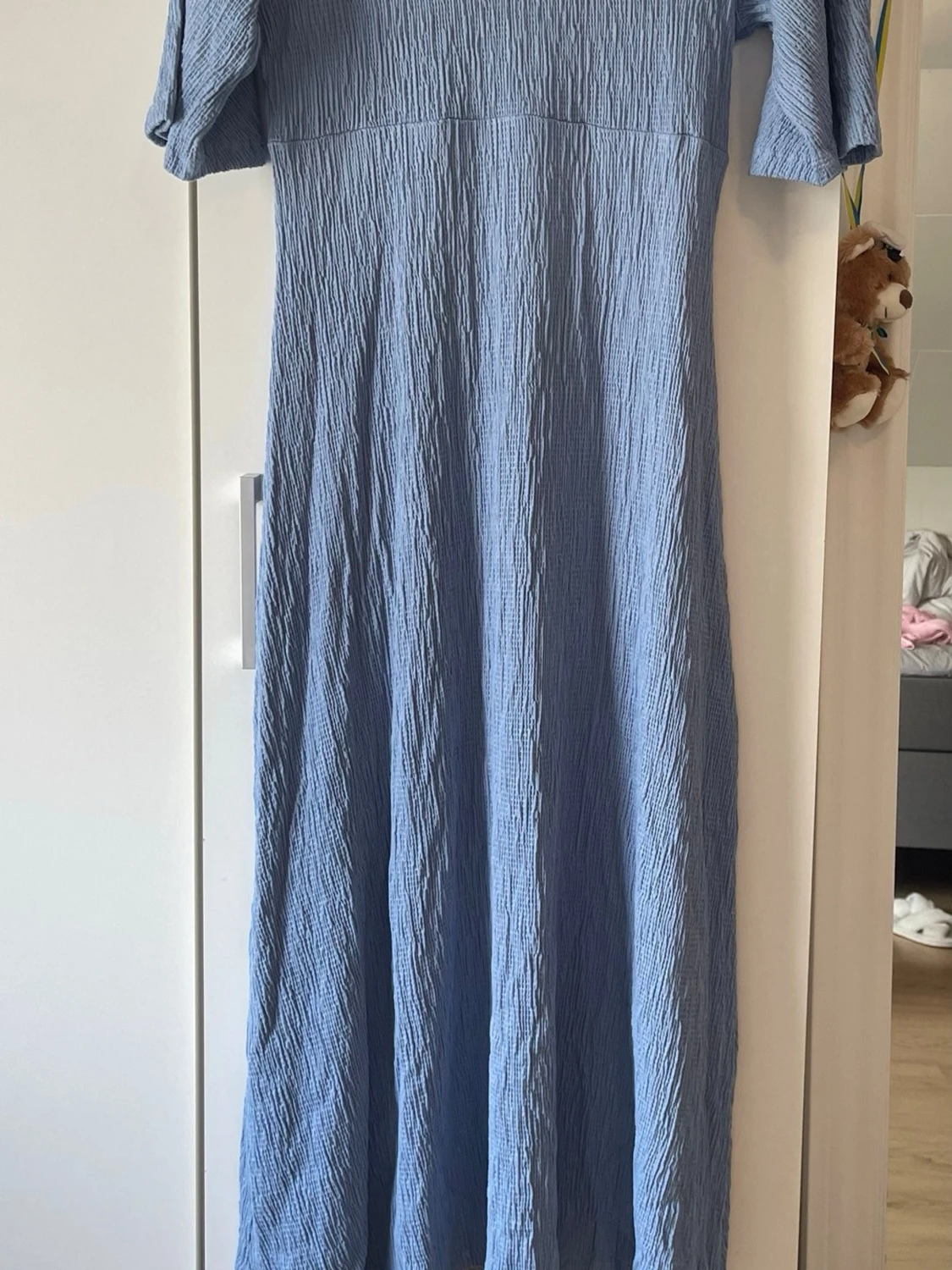 Ljusblå klänning med knappar - 2