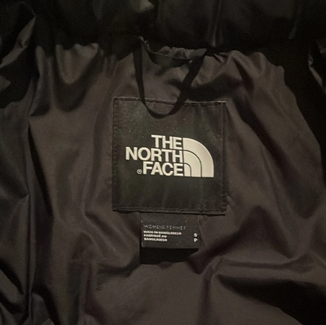 Svart dunjacka från The North Face - 90