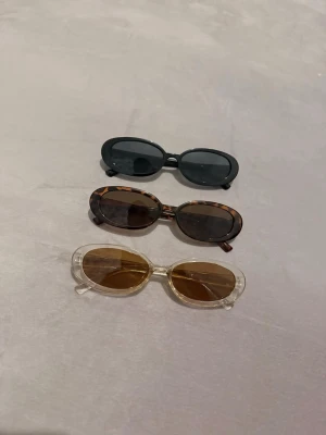 Solglasögon 3 Pack - Helt nya aldrig använts. Alla 3 st medföljer
