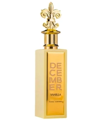 December Vanilla parfym guldflaska - Lyxig parfymflaska i guld med texten 'December Vanilla'. Flaskan har en fyrkantig form och ett dekorativt lock med guldfärgad lilja. Perfekt för dig som gillar eleganta och unika dofter med vaniljtoner.