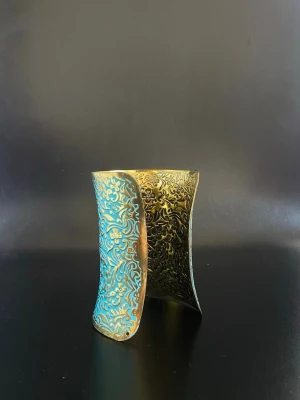 Bangle Cuff Bracelet  - Brand new blue and gold bangle cuff bracelet in metal. Can be shipped same day as purchased (or the day after if purchased past 20:00). I received it from my aunt who used to own Lady Marshmallow, I do have multiple pieces of that model.