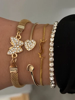 4 armband - YSL - Säljs tillsammans