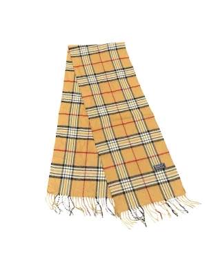 Beige rutig halsduk från Burberry - Klassisk beige halsduk från Burberry med ikoniskt rutmönster i svart, vitt och rött. Halsduken har fransar i ändarna och är tillverkad i mjuk ull. Perfekt accessoar för att lyfta din outfit med en tidlös och lyxig känsla.                                             💪🏽Skick:Mycket bra   📐Mått:Längd:160cm:Bred:30cm  📎Material:100%Lambswool  📦Skickar alltid inom 48h  ✅Äkthetsgaranti