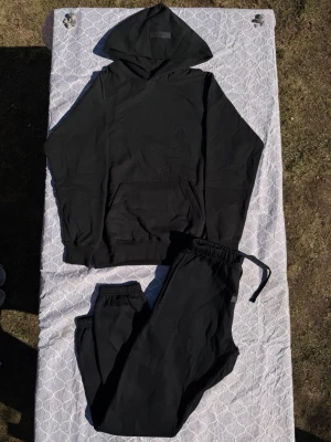 Essentials black cuffed tracksuit - Size M, true to size. As new. Very comfortable and never worn