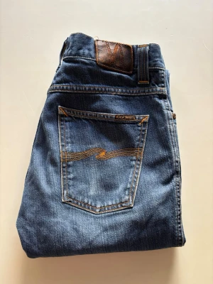 Nudie Slim Jim 31/32 - Bra skick
