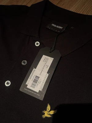 Ny pike från lyle n scott - Aldrig kommit till användning, köpt på johnells med lappen kvar för 750kr. Storlek S. Pris diskuterbart vid snabb affär och bara att höra av sig om fler bilder önskas!