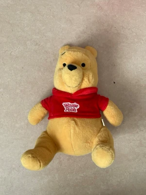 Winnie the Pooh gosedjur  - Väldigt söt och väl tagen hand om. 