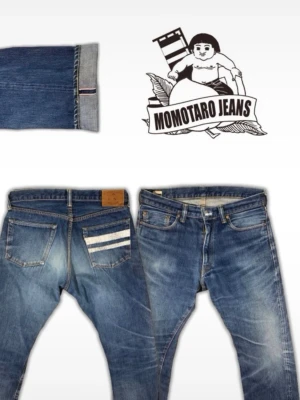 Momotaro ’0206SPZ GTB’ - Momotaro 0206SPZ, med de ikoniska GTB-stripsen. Fina fades, fint skick, lite sliten knappgylf men inget som påverkar funktionen!                                                                         Midja: 43 Innerben: 78 Ytterben: 102 Benöppning 21