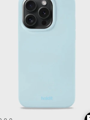 Ljusblått silikonskal Holdit iPhone 15 Pro - Snyggt ljusblått silikonskal från Holdit till iPhone 15 PRO. Helt nyköpt