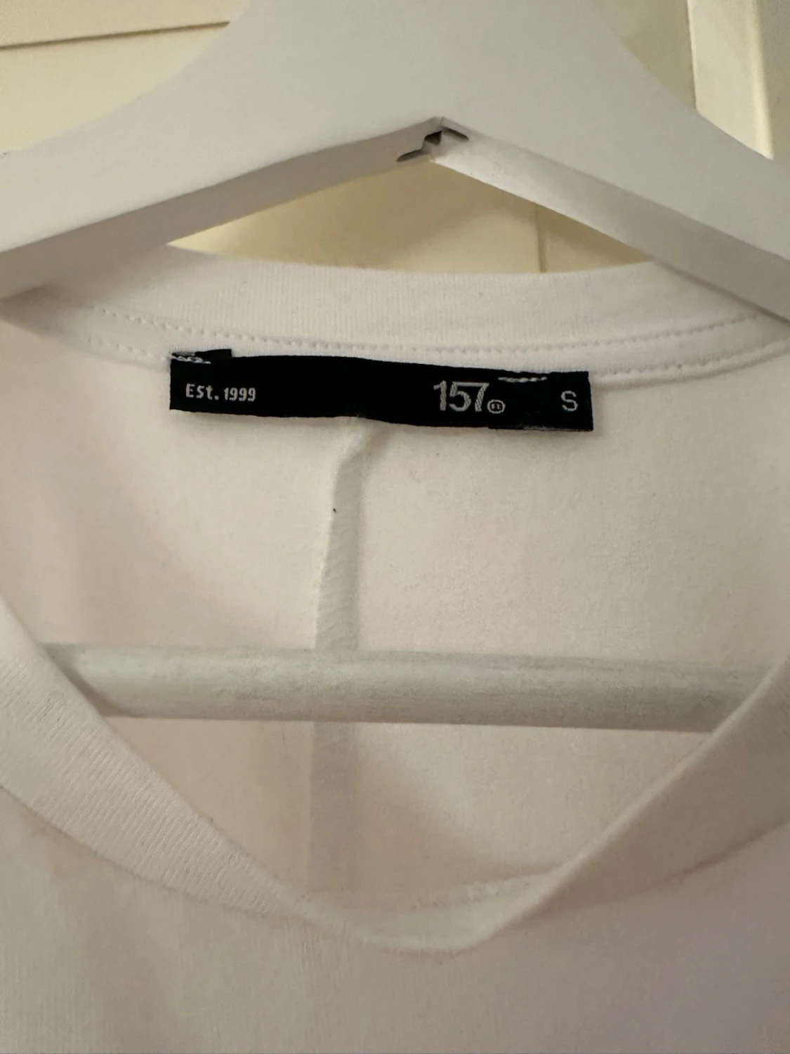 Vit topp med smock från 157 - 1