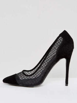 Svarta mesh-pumps med spetsig tå - Snygga svarta pumps med spetsig tå och höga stilettklackar från Public Desire. Skorna har meshdetaljer och mockaimitation vid tå och häl. Klackarna är väldigt sparsamt använda och är i bra skick. 