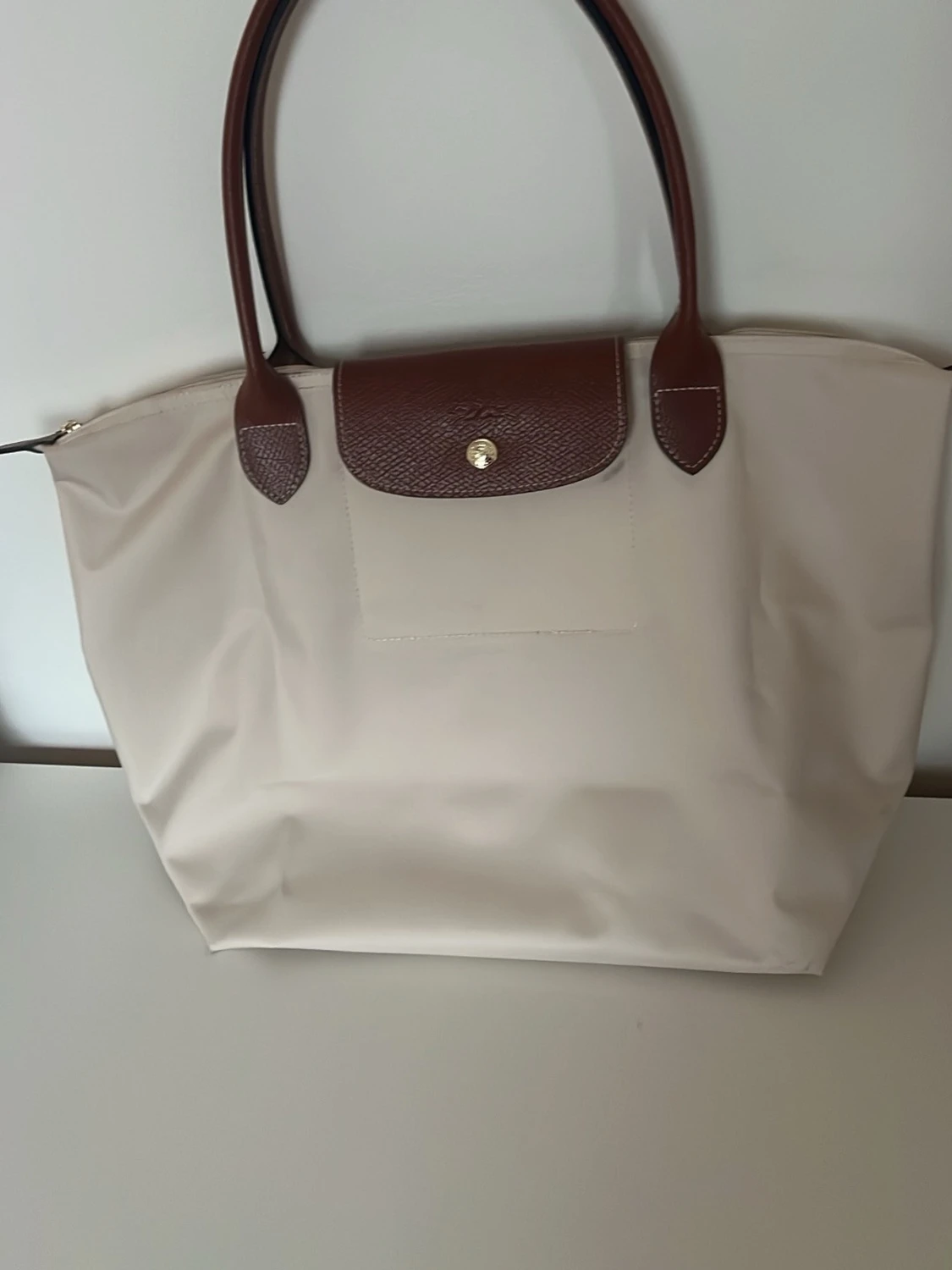 Beige Longchamp Le Pliage handväska