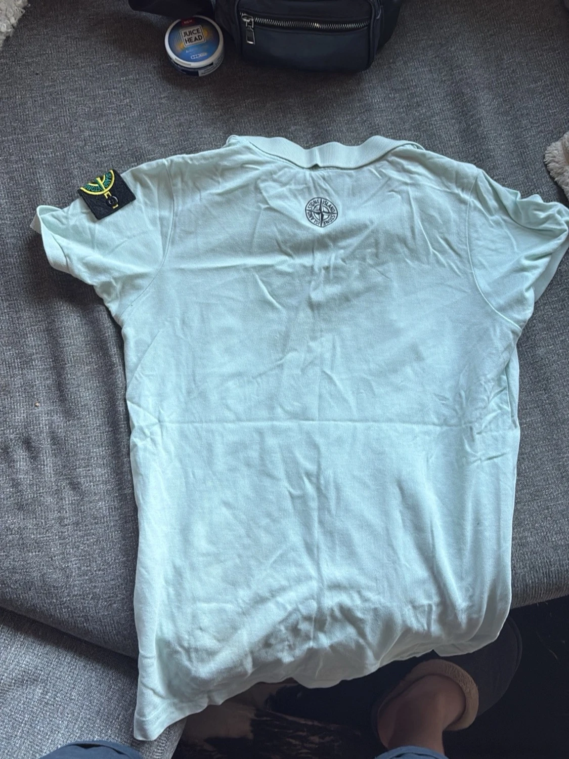Ljusgrön pikétröja från Stone Island