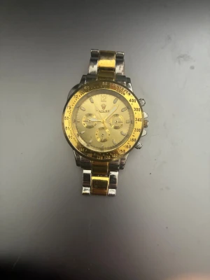 Roléxdaytoona guld o silver - Priset kan diskuteras vid snabb affär (liten i storlek)