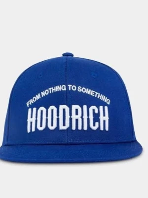 Hoodrich Keps - Snygg blå snapback keps från Hoodrich med vit broderad text 'FROM NOTHING TO SOMETHING' och 'HOODRICH' framtill. Klassisk platt skärm och justerbar baksida. Perfekt för dig som vill ha en streetwear-look och gillar tydliga loggor.