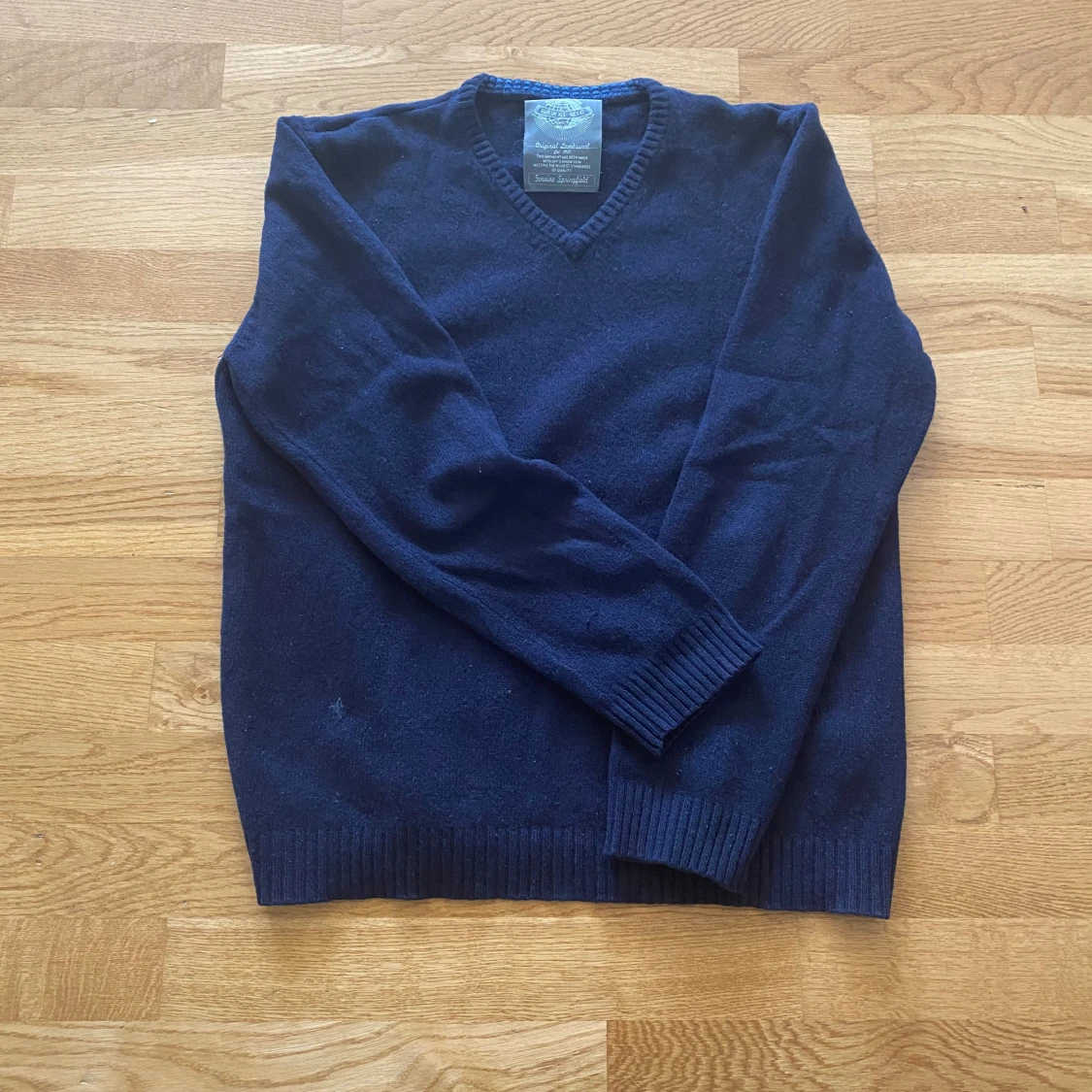 Mörkblå ulltröja från Springfield