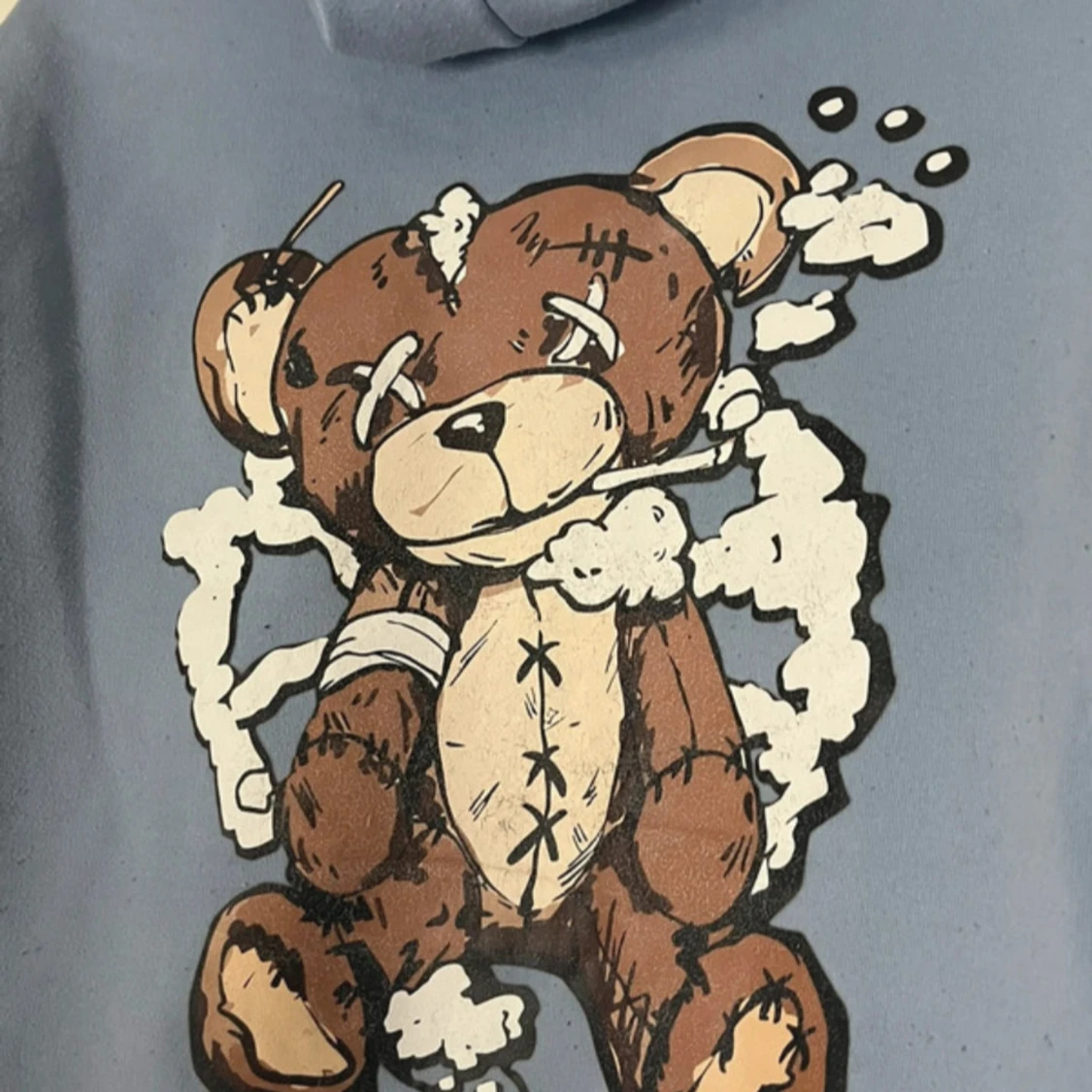 Blå hoodie med nalletryck