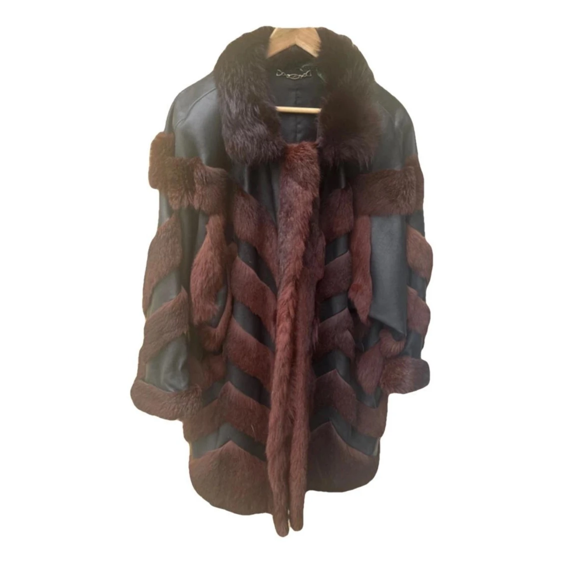 Svart och brun pälsjacka med skinn