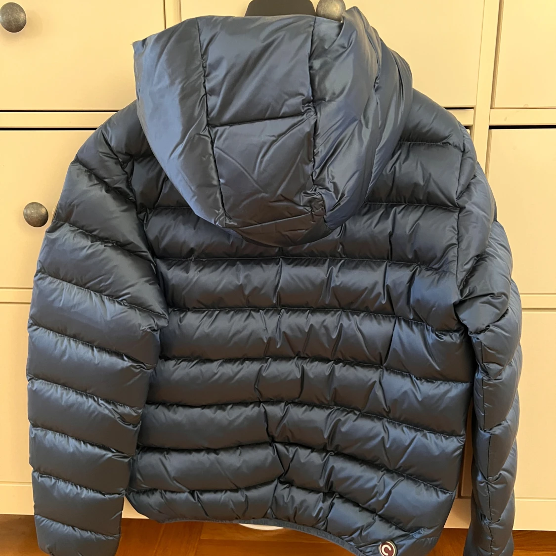 Mörkblå Colmar pufferjacka med huva - 1