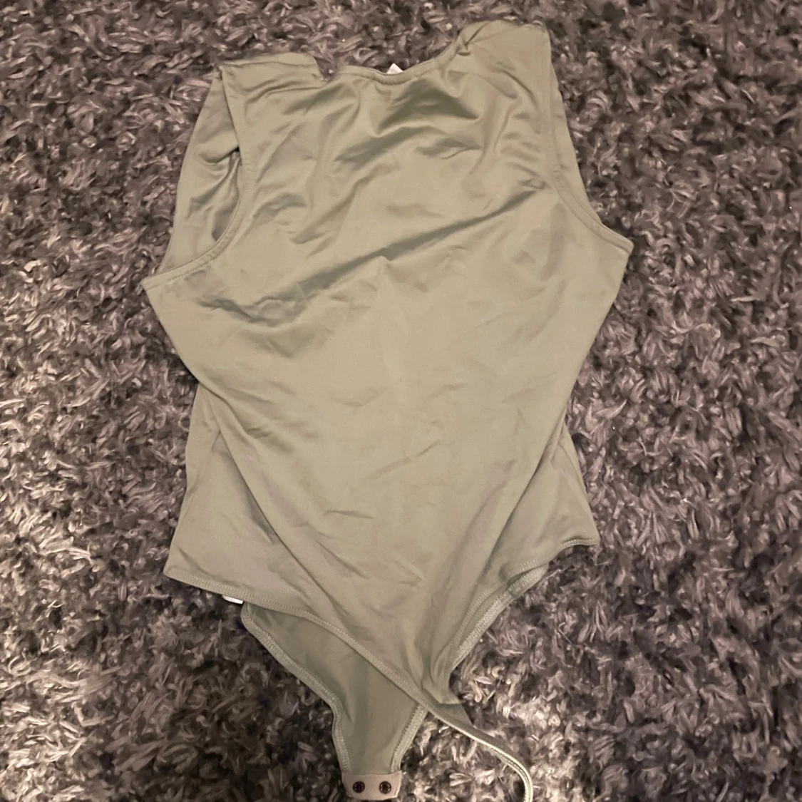Ljusgrön ärmlös bodysuit från Aritcot - 1