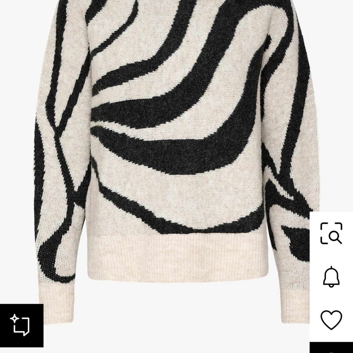 Beige och svart stickad zebramönstrad tröja