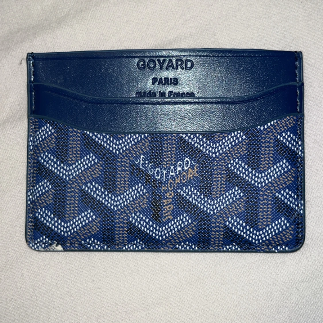 Blå HM plånbok med mönster