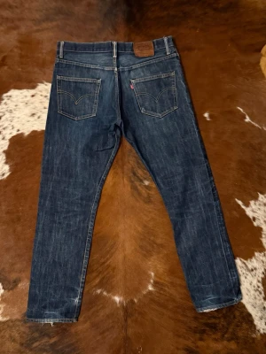 Big E Levis 501XX - Tjena! Säljer dessa vintage Levis 501XX, byxorna är i fint skick och är i storlek W34/L32, fint skick men finns lite små skavanker, hör av dig vid funderingar!🙌