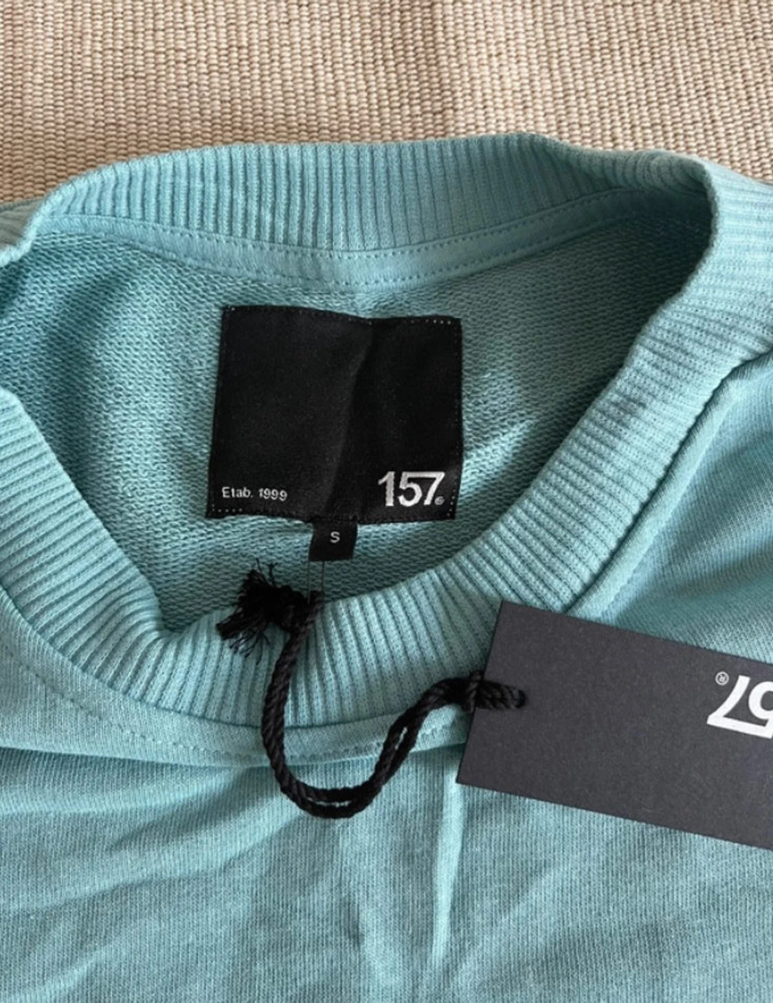 Turkos stickad väst från 157 - 1