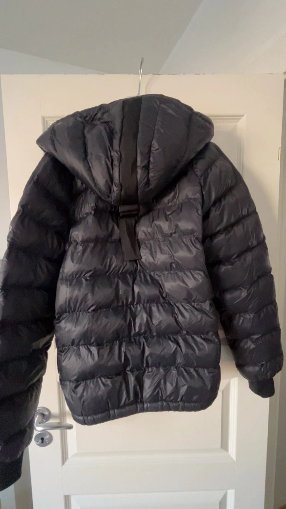 Svart dunjacka Peak Performance - 1