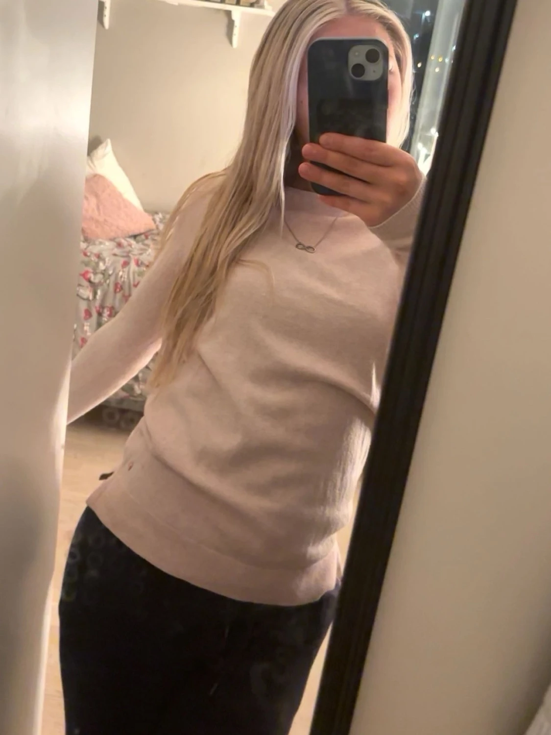 Ljusrosa stickad tröja